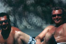 Larry & Tim planning on each having the other guy call in sick so they can surf more